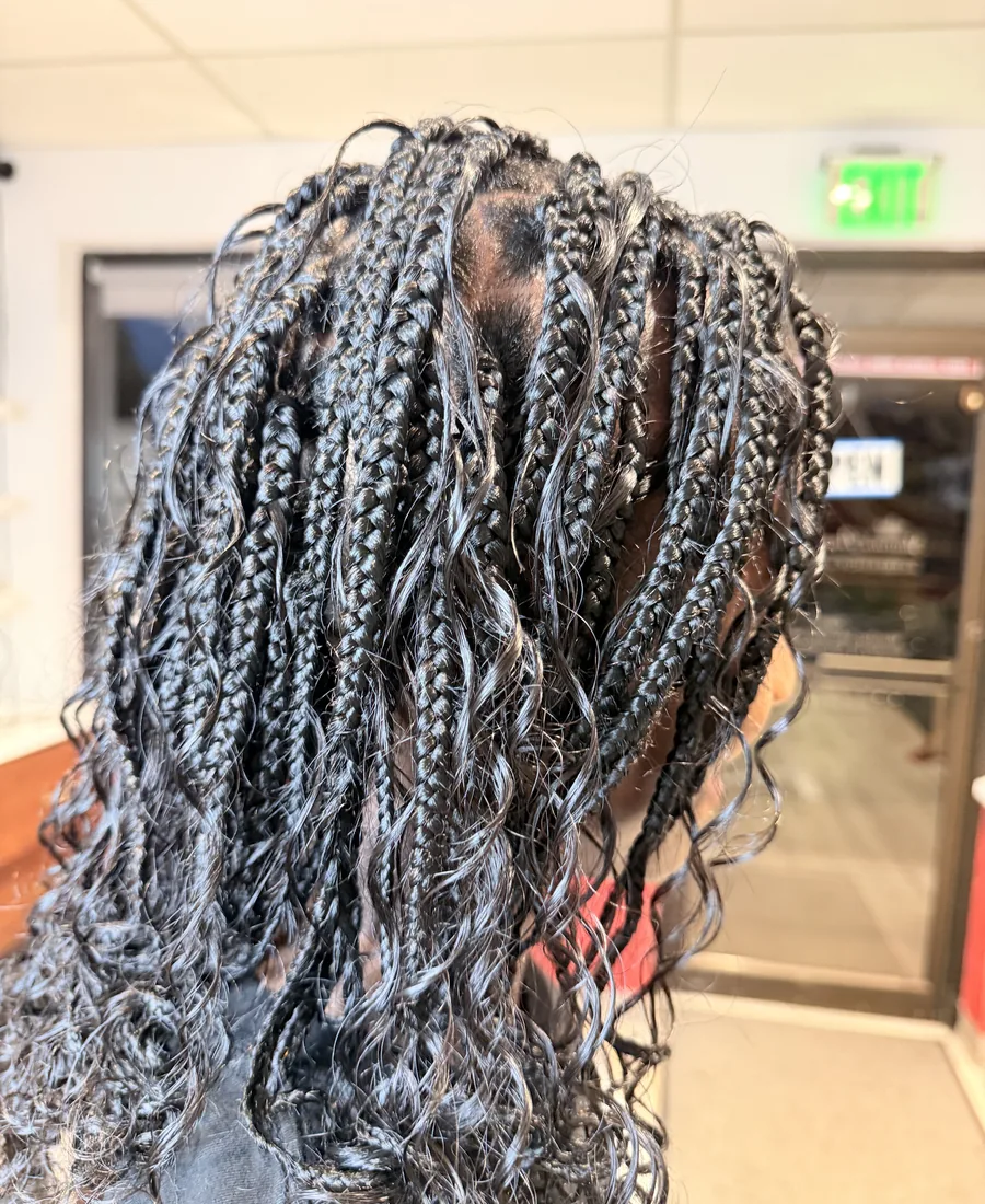 Boho braids with loose curly ends